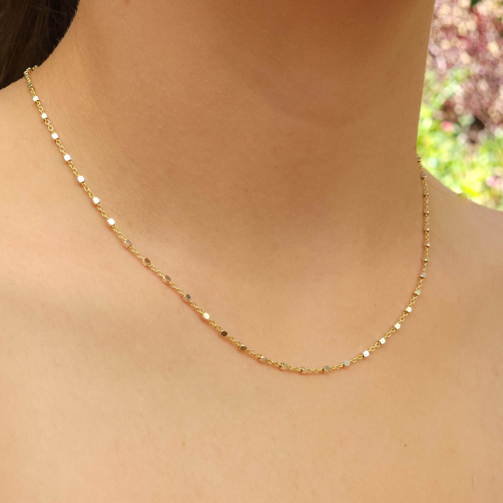 Close-up detail of Yellow Gold Chain with Rhodium Cube Beads