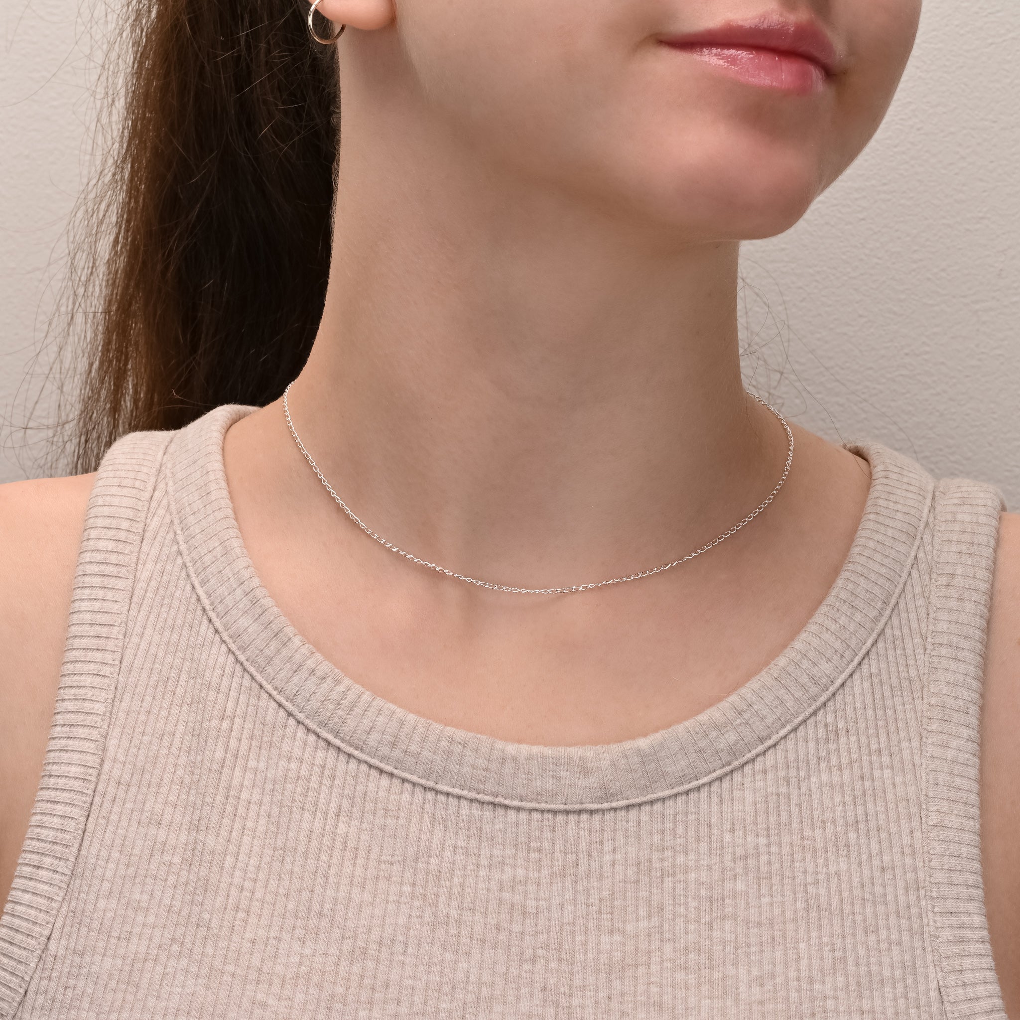 Close-up detail of Long curb diamond cut silver chain 1.3mm