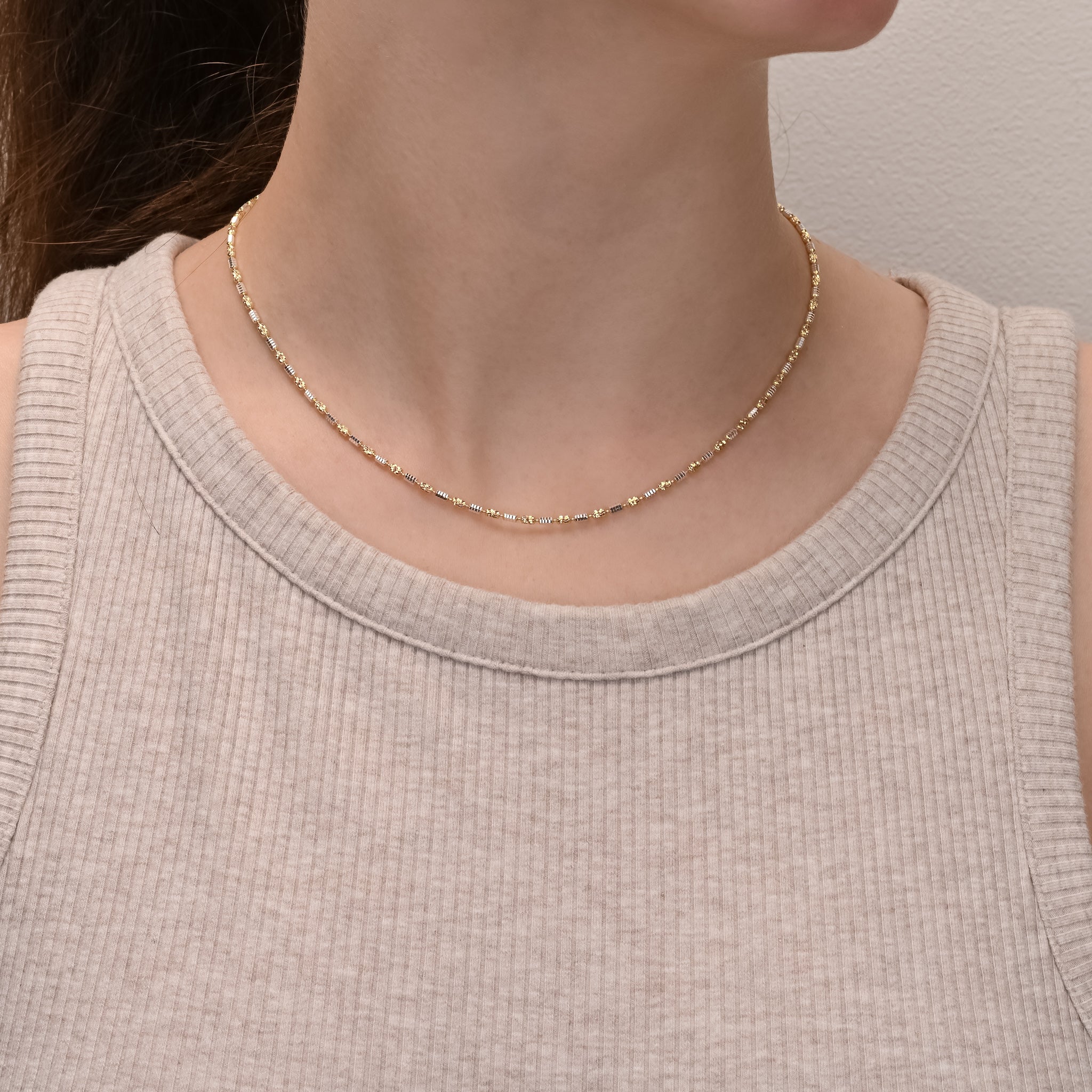 Studio shot of Yellow Gold & Rodium Beaded Silver Chain
