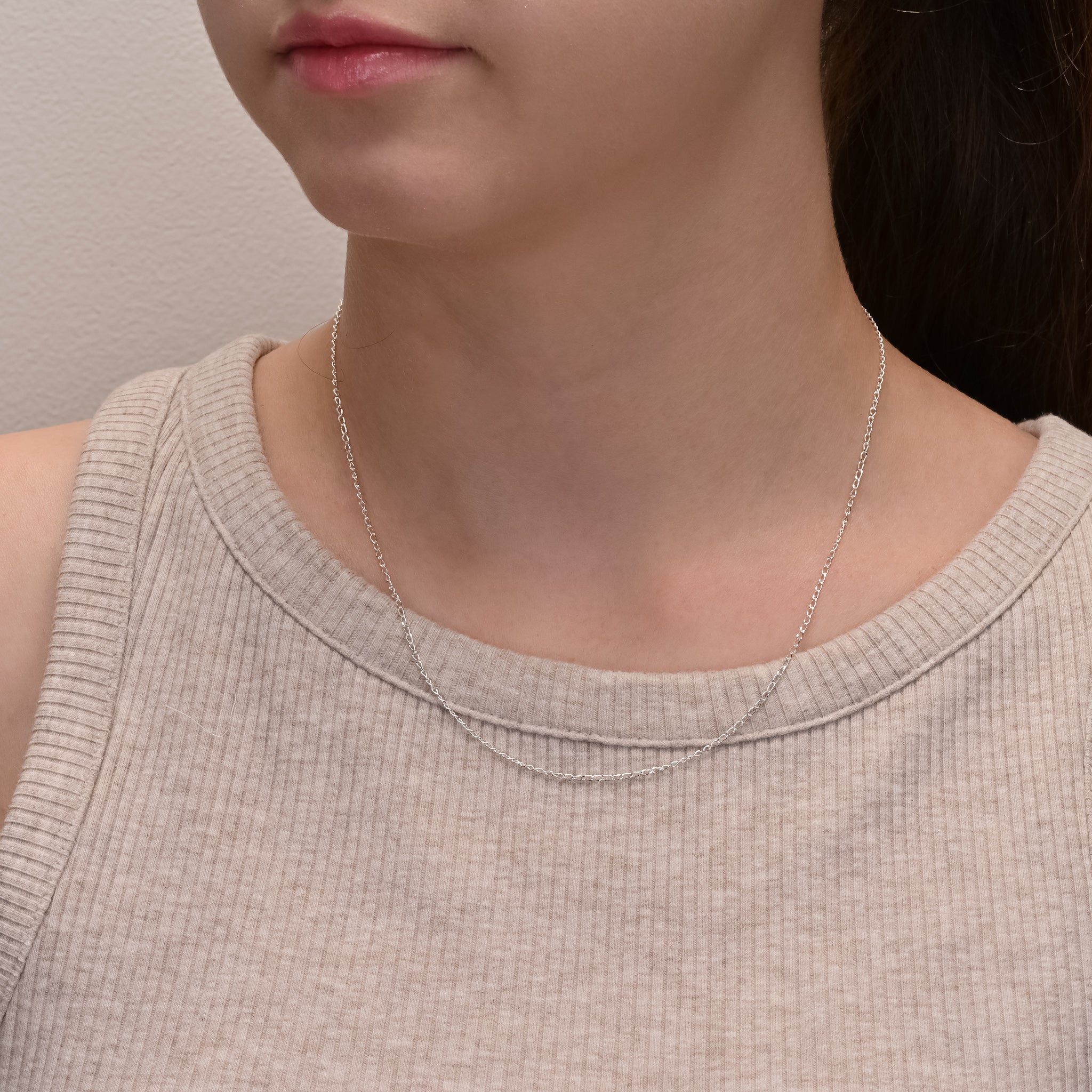 Alternate angle of Long curb diamond cut silver chain 1.3mm