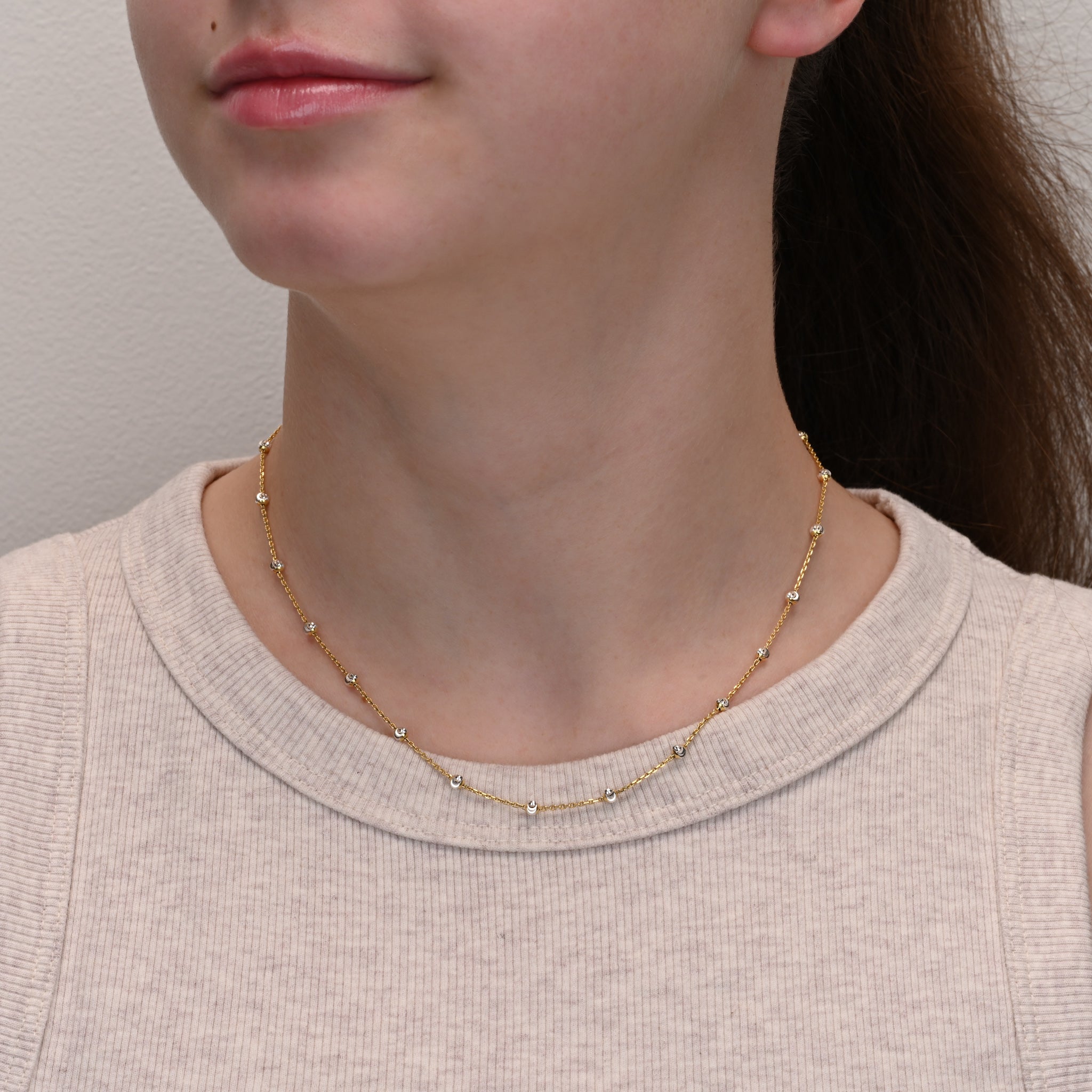Studio shot of Gold-Plated Sterling Silver Chain Silver Beads