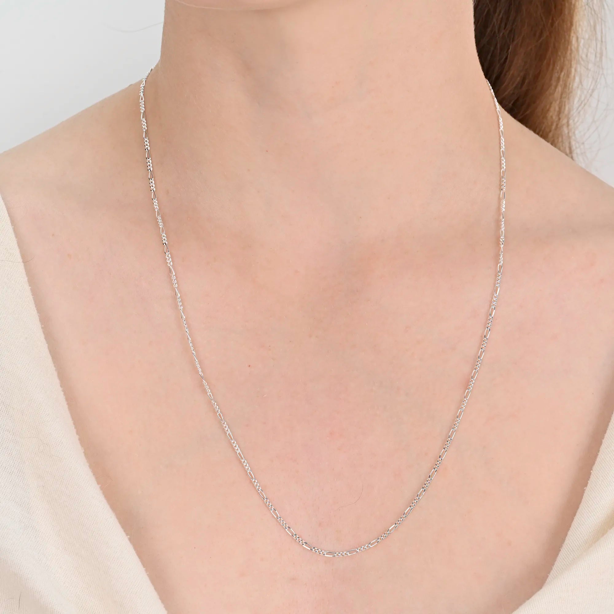 Close-up detail of Figaro silver chain 1.7mm
