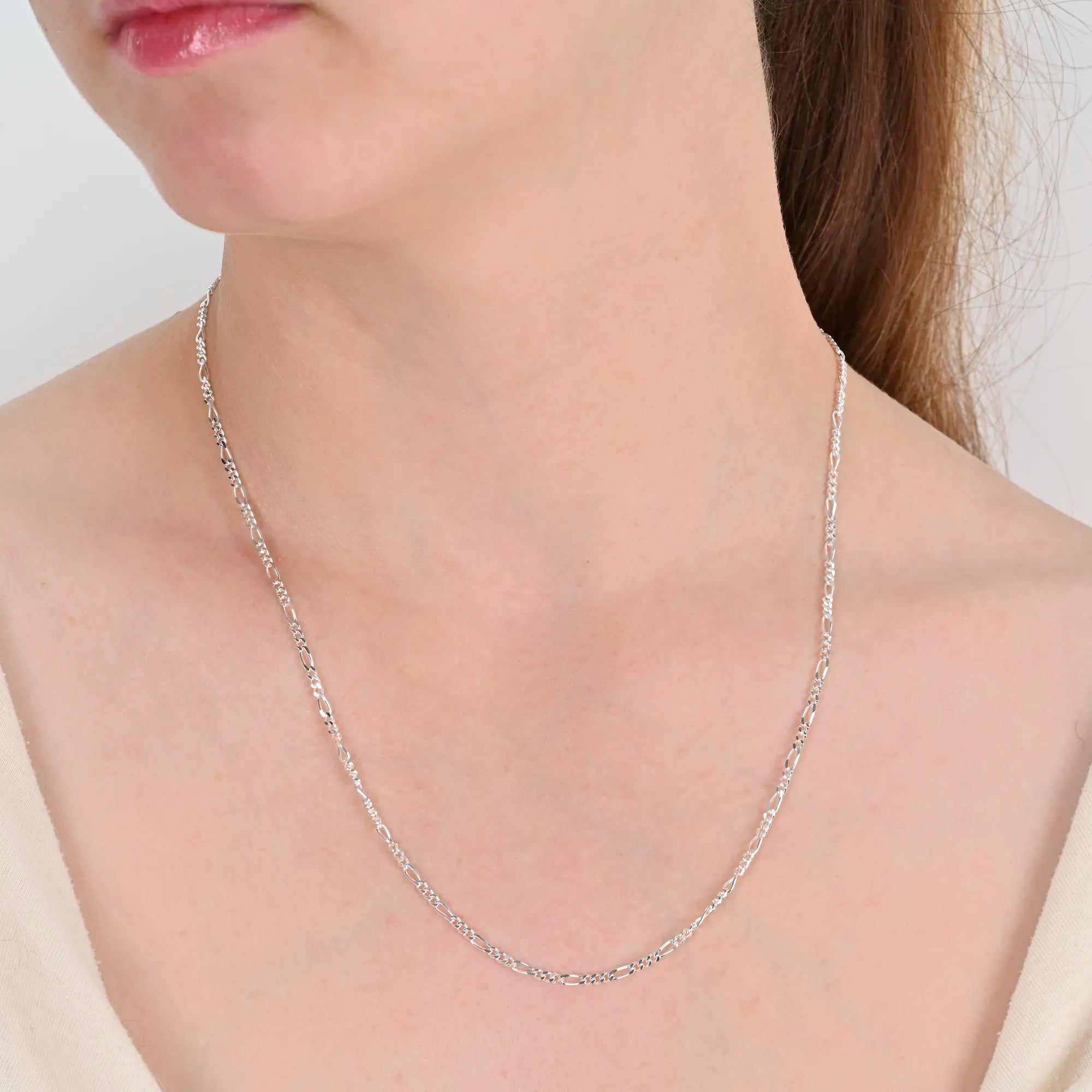 Close-up detail of Figaro silver chain 2.2mm