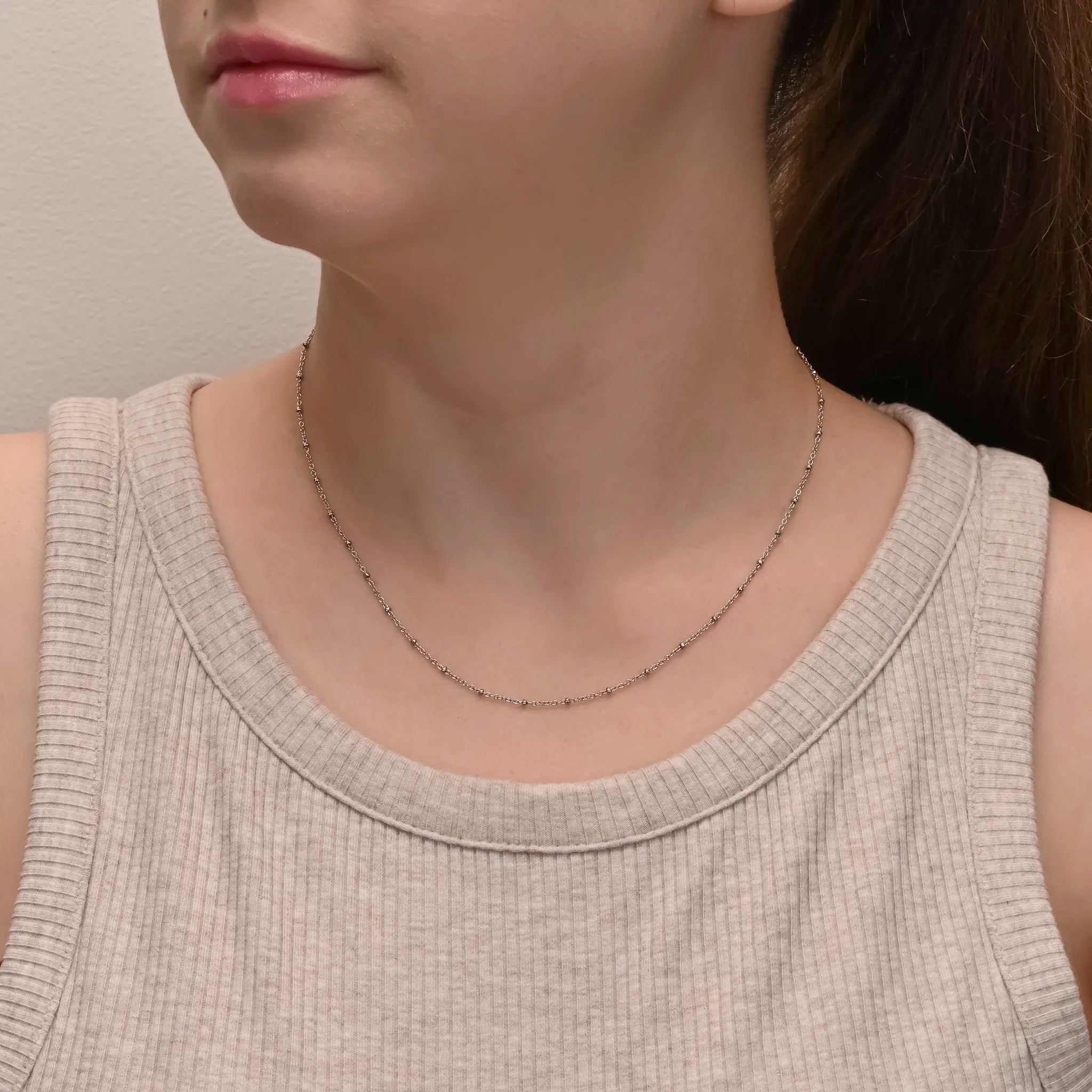 Alternate angle of Rhodium plated silver chain with small beads